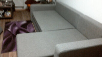 Rohová rozkládací sedačka s úložným prostorem