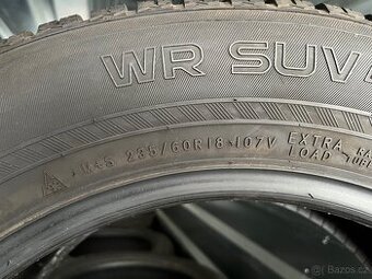 235/60 R18 107V