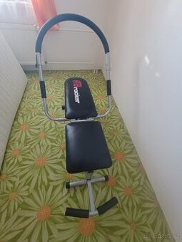 Cvičící stroj - lavice AB rocker