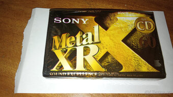 různé kazety, nové-- zabalené, i nahrané + kufříky (asi 25ks