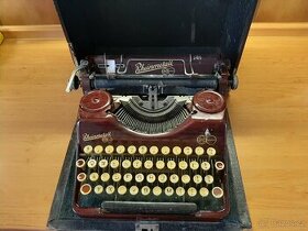Kufříkový psací stroj