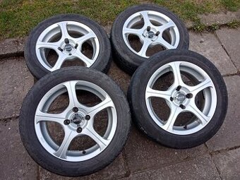 Obutá alu kola DOTZ 15ky 4x108 PEUGEOT CITROEN - dobírka