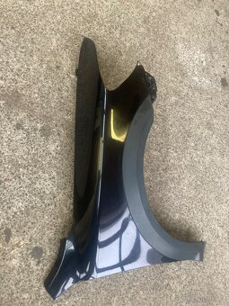 Octavia 2 facelift  Scout blatník Pp  černá metalická