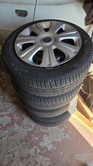 Ford Mondeo Mk4 plechové - zimní disky s poklicemi+ pneu