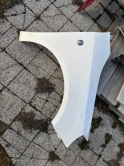 Škoda Fabia II FACELIFT blatník přední