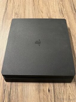 PlayStation 4 Slim 500 GB + 2 ovladače + FIFA 21 + krabice