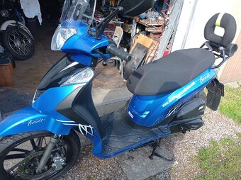 Skútr 125 ccm
