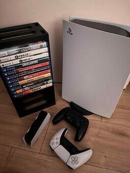 Playstation 5, 2x ovladač, dobíjeci stanice, 11 her + stojan