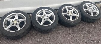 Prodám alu kola 5x100,7Jx15,ET35 s letními pneu