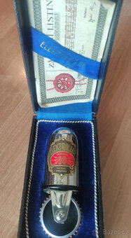 Historický masážní strojek