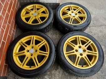 Alu 16" 4x100, Orig . Honda / Mazda , letní 92%
