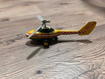 Plechový vrtulník na setrvačník retro hračka