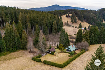 Roubená chalupa s pozemky o výměře 21.245m2 v obci Morávka -