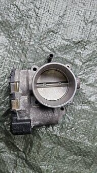 Škrtící klapka 1.8t 110-132kw