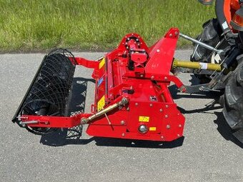 Zakladac travniku za traktor