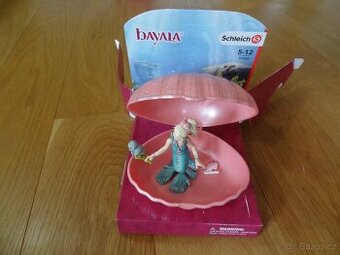 Schleich 70564 Mořská panna s malým tuleněm v mušli