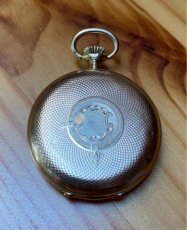 zlaté kapesní hodinky