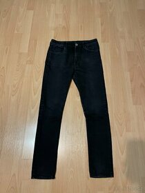Černé chlapecké džíny (velikost 164)
