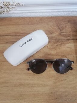 Brile a pouzdro Calvin Klein
