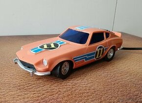 Stará hračka Datsun 1977 na bowden