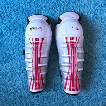 Chrániče holení Nike Bauer Junior - vel. 28 cm/11"