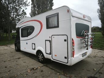 Obytné auto Burstner ixeo sjížděcí postel garáž,59TIS.KM