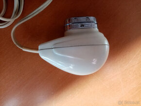 Starý holicí strojek..