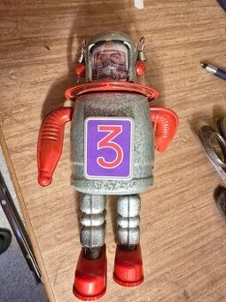 Stary kovovy robot -hračka