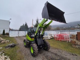 Nádherný nakladač 4x4 .vytápění.