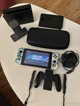 Nintendo switch + příslušenství a pár her