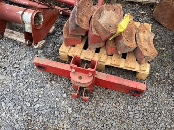 Díly traktor RS 09 (závaží, čerpadla, portály atd.)