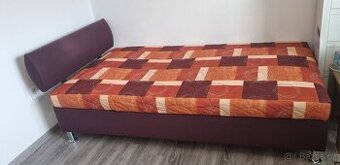 Postel s úložným prostorem