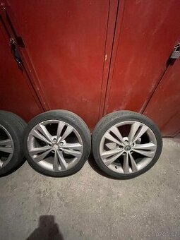 Alu kola Neptun 5x112 R18