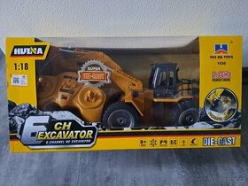 Bagr na ovládání s kovovou lžící