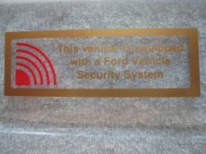 Nová varovná samolepka na sklo k alarmu Ford Security System