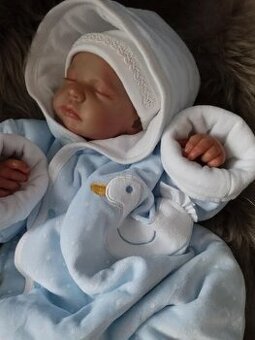 Modrý plyšový overal zn.Sardon