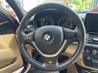 e70 x5 volant