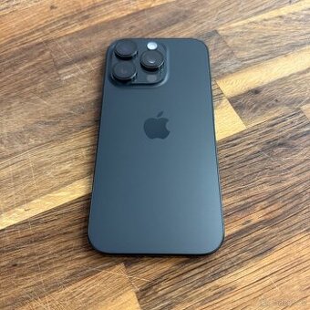 iPhone 16 Pro 128GB black titan, pěkný stav, rok záruka