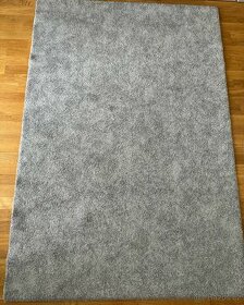 Praktický koberec