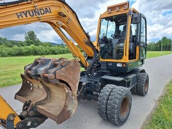 Kolesový otočný bager Hyundai 55w-9a robex - 1