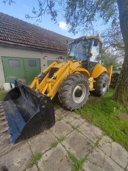 Traktorbagr new holand lb115b - 1