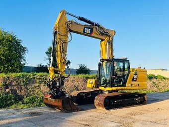 Pásové rypadlo Caterpillar 323 - 1
