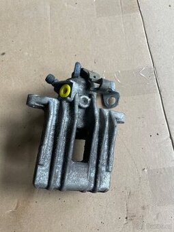 Levý zadní brzdový třmen Volkswagen Polo 6R