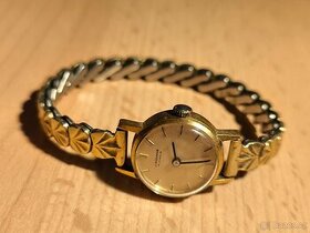 Staré dámské hodinky Junghans.