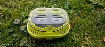 Přepravka a běhací kolečko pro křečka