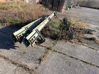 Součásti příčných dopravníků kulatiny