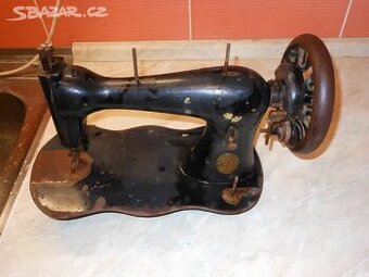 STAROŽITNÝ ŠICÍ STROJ THE SINGER M F G  CON. Y  TRADE MARK.