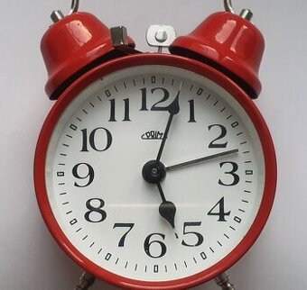 Prim červený natahovací budík