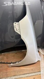 Levý blatník Škoda Octavia 2 stříbrný