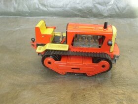 Funkční starožitná hračka plechový pásový traktor
